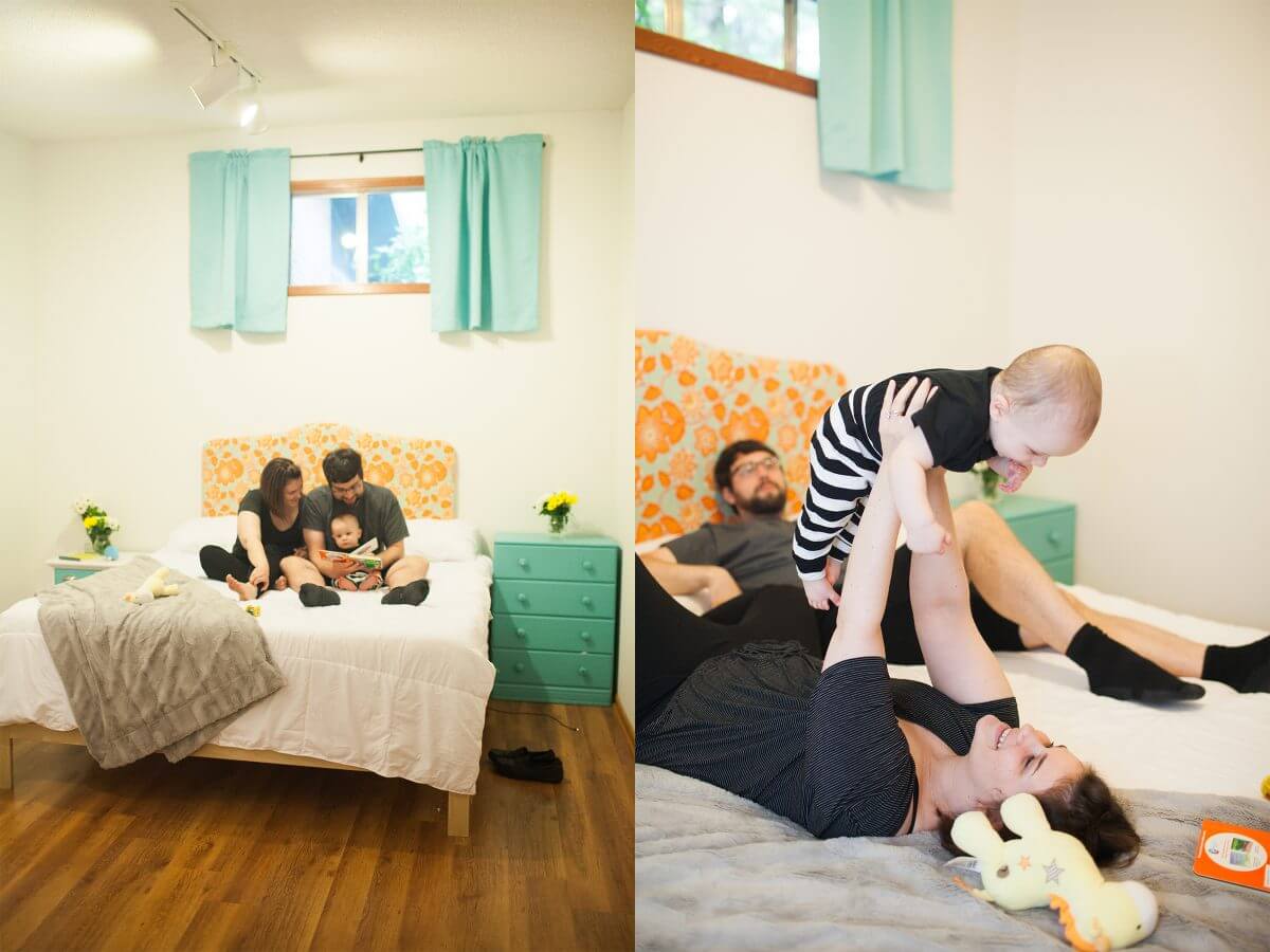 parents playing with baby on bed in their bedroom